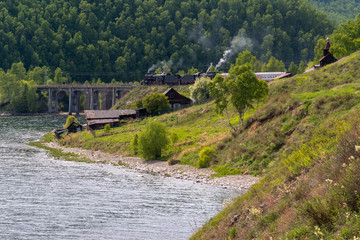 Fototapeta na wymiar Old steam locomotive on the station