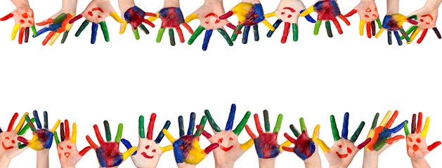 Children's smiling colorful hands raised up. The concept of classroom or back to school