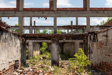 Construction Columns and Beams in Heavily Damaged and Ruined Abandoned Building