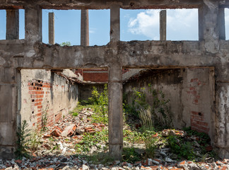 Construction Red Brick Walls, Columns and Beams in Heavily Damaged and Ruined Abandoned Building