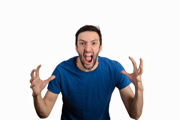 Fototapeta premium Young man shouting and screaming
