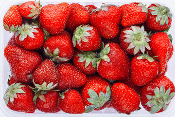 Juicy, ripe natural red strawberries without GMO. Strawberry - full frame. Close-up