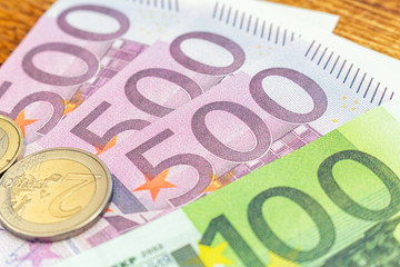 Pack of euro banknotes and coins background finance economy currency close up selective focus Europe currency