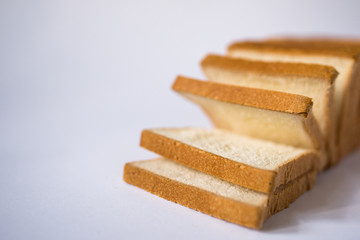 slices of bread on white background