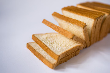 Fototapeta na wymiar slices of bread on wooden board