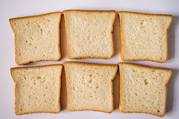 slices of bread on white background
