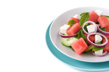 Watermelon salad with feta cheese isolated on white background. Copyspace