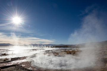 Aguas termales de Polques, hot springs with a pool of steaming natural thermal water in Bolivia