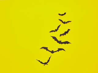 Halloween decorations, bats on a yellow background