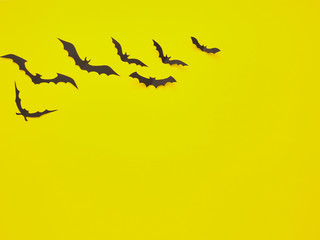 Halloween decorations, bats on a yellow background