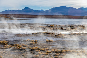 Aguas termales de Polques, hot springs with a pool of steaming natural thermal water in Bolivia