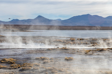 Aguas termales de Polques, hot springs with a pool of steaming natural thermal water in Bolivia