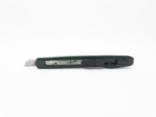 Vintage and Used Rusty Cutter Knife in White Isolated Background