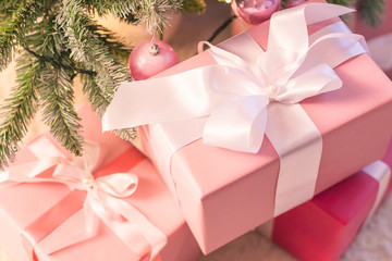 A Christmas present for the baby. Beautiful box with ribbon. Soft focus.