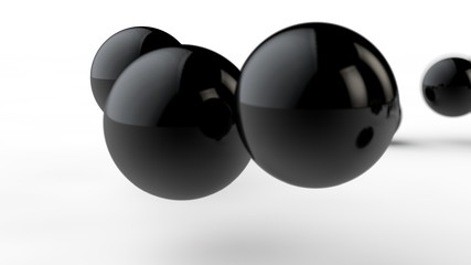 3D illustration of large and small black balls, spheres, geometric shapes isolated on a white background. Abstract, futuristic, cropped image of perfectly shaped objects. 3D rendering