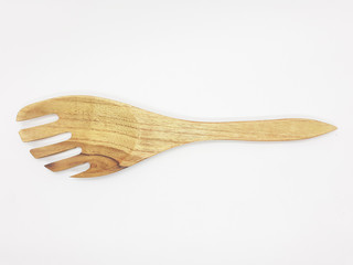 wooden brown traditional salad spoon in white isolated background