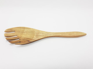 wooden brown traditional salad spoon in white isolated background