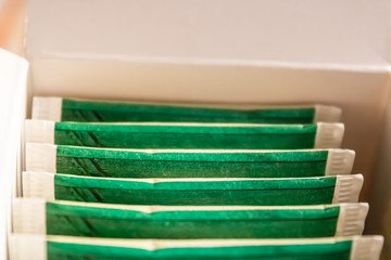 Fototapeta na wymiar Green tea bag in the cardboard box - Image