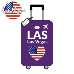 Luggage with airport station code IATA or location identifier and destination city name Las Vegas, LAS. Travel to the United States of America concept. Heart shaped flag of the USA on the baggage. © bulgn
