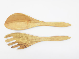 wooden brown traditional salad spoon in white isolated background