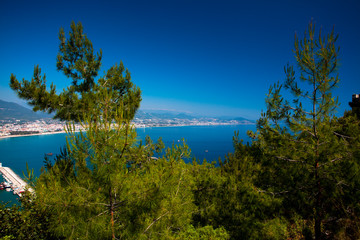 Beautiful view of the Mediterranean Sea, the mountains, the forest and the city. Turkey, Alanya.