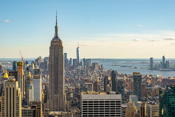 Cityscape of midtown skyscrapers and buildingds at sunset view from rooftop Rockefeller Center