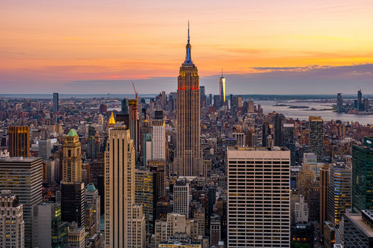 Cityscape of midtown skyscrapers and buildingds at sunset view from rooftop Rockefeller Center