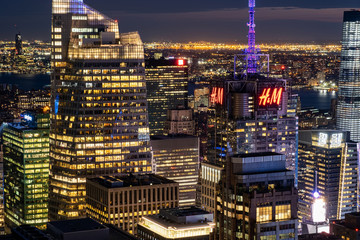 Dusck cityscape of midtown skyscrapers and buildingds view from rooftop Rockefeller Center