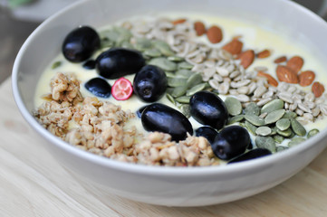 smoothie bowl,mango yogurt with fruit and almond