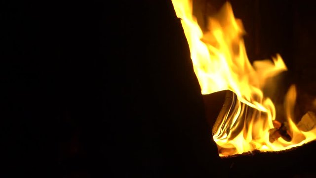 Horizontal panorama of burning wood in a stone oven