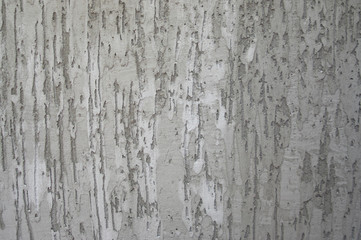  gray plaster on the insulated walls of the facade