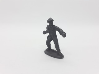 Black Colored Plastic Army Men with Gun Toys for Kids in White Isolated Background