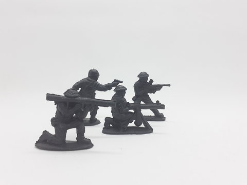 Black Colored Plastic Army Men with Gun Toys for Kids in White Isolated Background