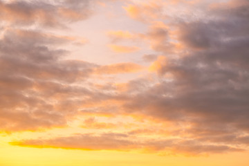 Fototapeta premium Cloudy sky with colorful color in orange, blue, yellow and pink color and cloud texture background for landscape