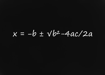 Fototapeta na wymiar Quadratic Formula written on blackboard