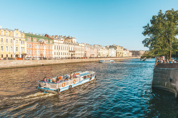 Obraz premium Cruise boats on Fontanka river, St. Petesburg, Russia