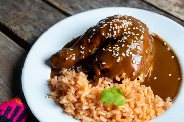 Mexican chicken with mole sauce and red rice
