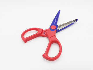Colorful Scissor Design with Various Paper Pattern Cutting for Children Education in White Isolated Background