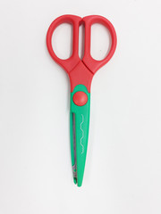 Colorful Scissor Design with Various Paper Pattern Cutting for Children Education in White Isolated Background