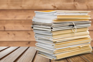 File folders with documents isolated on white background