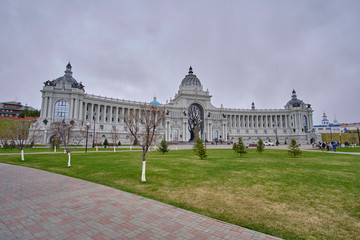 Obraz premium Scenic view of building of Ministry of agriculture near kremlin in historic center of old city Kazan in Russia. Beautiful cloudy summer look of official house in capital of Tatarstan republic