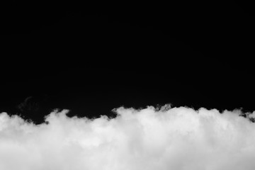Isolated clouds over black.