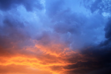 Colorful clouds at sunset background