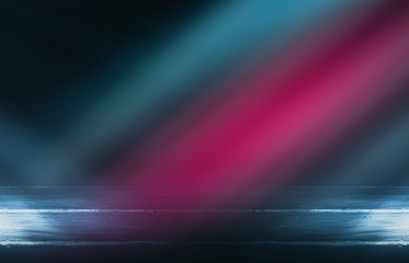 Empty background scene. Dark street reflection on wet asphalt. Rays of neon light in the dark, neon figures, smoke. Background of empty stage show. Abstract dark background.