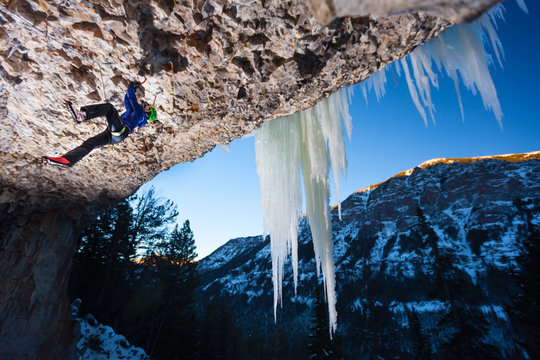A climber on Inglorious Basterds (M12) in Hyalite Canyon during the 17th Annual 2013 Arc'teryx Bozeman Ice Climbing Festival.