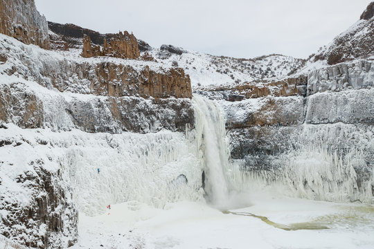 Alpinists Jess Roskelley and Scott Coldiron climbing the volatile spray ice that forms around the amphitheatre of the 187-foot Palouse Falls in southeast Washington State during a rare zero-degree cold snap.  Spray ice, formed from frozen mist from the neaby falls, is sketchier than normal water ice as it is aerated and poorly adhered to the rock, making it difficult or impossible to protect while climbing. Coldiron called it, "one of those things that's fun to do... ONE time!"
