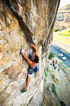 Adrian Daigle climbs Hand Over Hand 5.11a at Granite Point, a small climbing area along the Snake River in southeast Washington.      