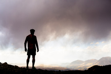 Gold King Basin, near Telluride, Colorado, USA: A male runner running the alpine trails at the Gold King Basin.