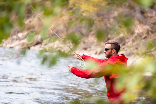 San Miguel River, near Telluride, Colorado, USA: A male fly fischer.