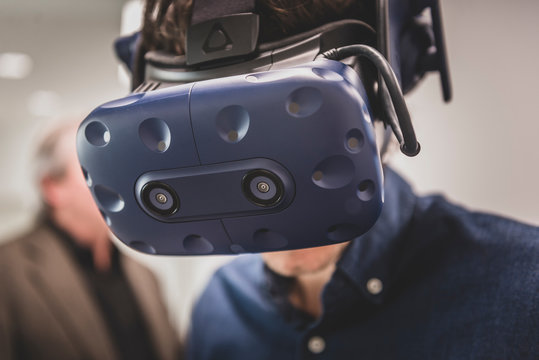 Close Up of man experimenting Virtual Reality googles